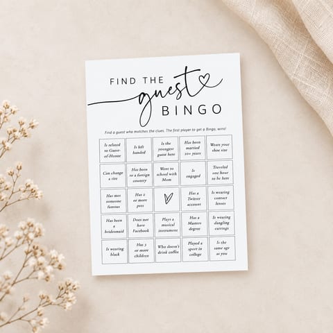 Minimal wedding shower “Find the Guest Bingo” printable card on a soft beige background with dried flowers and neutral linen fabric.