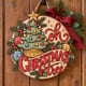 Painted round Oh Christmas Tree sign with a vintage ceramic tree hanging on a wooden front door