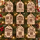 Engraved wooden Santa Tracker tags hanging on a Christmas tree